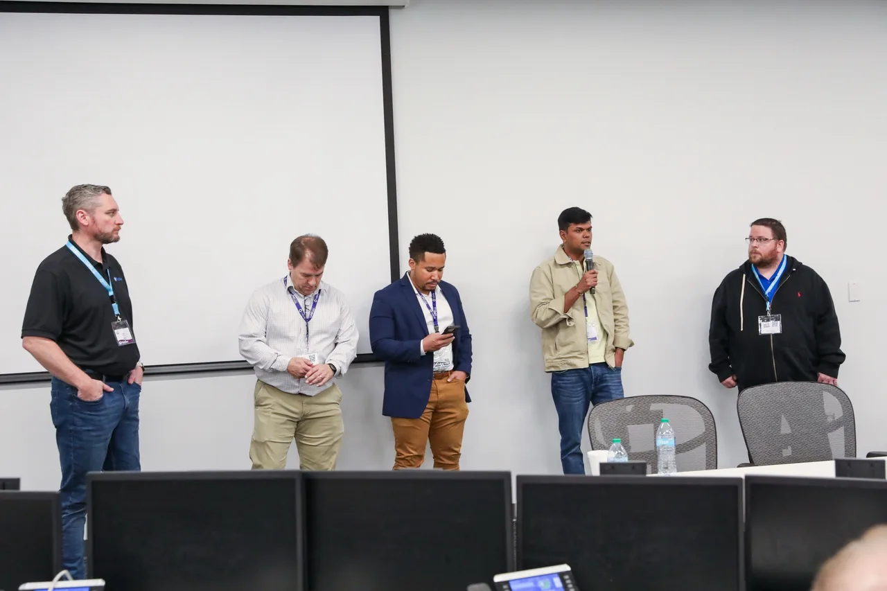 Practitioners sharing ideas in a MITechCon session